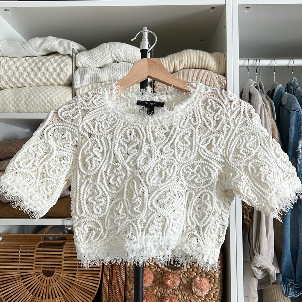 Cute crop top with pretty details. New with tag